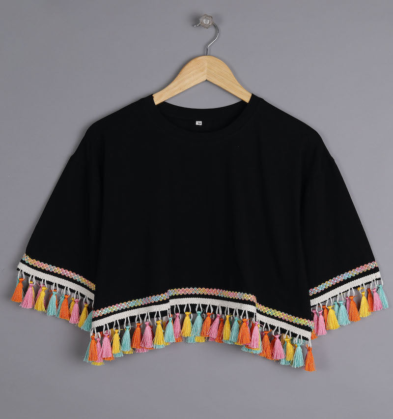 SUMMER VIBES: BLACK TOPS WITH MULTICOLORED TASSEL TRIM